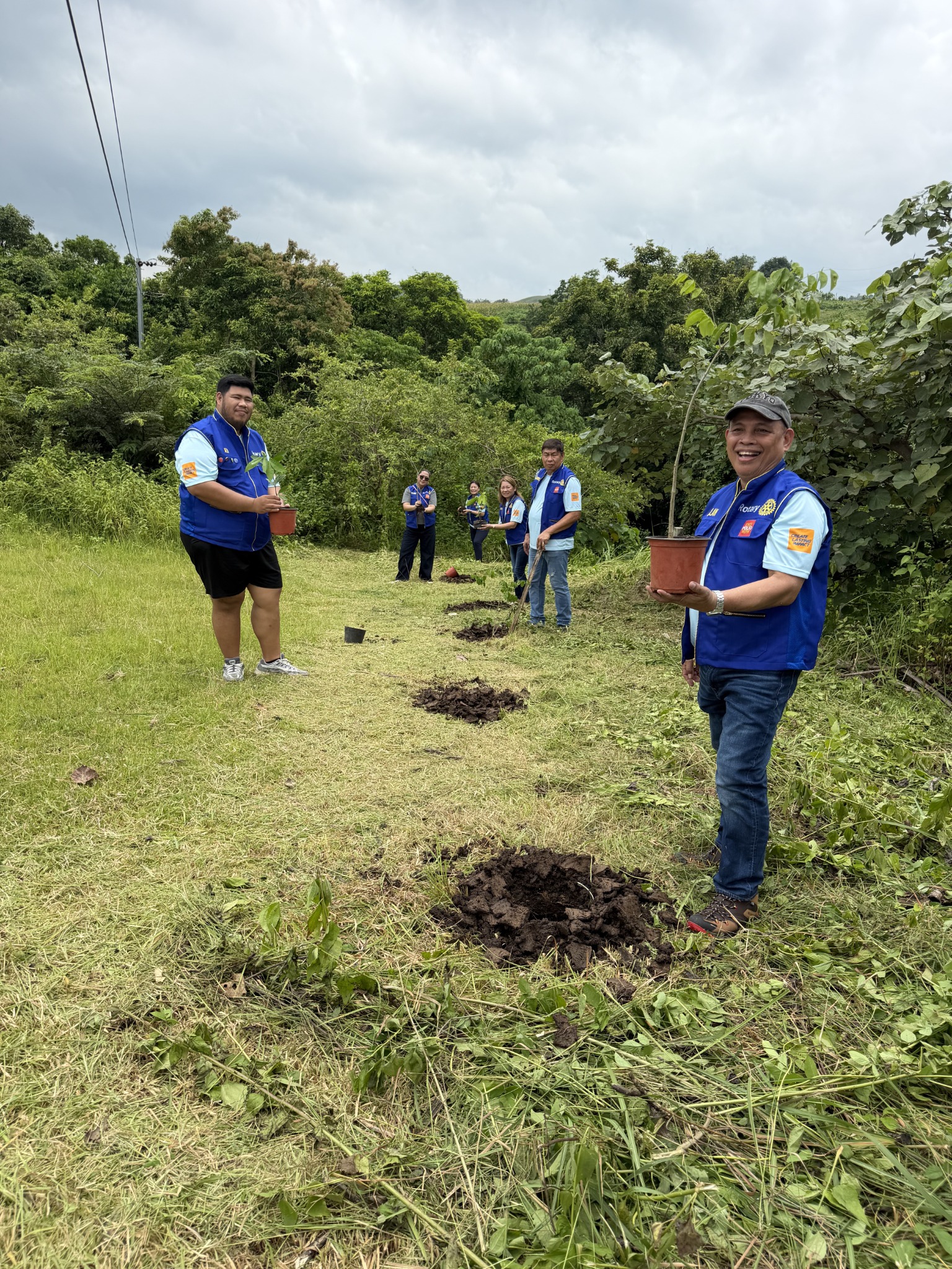 RCMC volunteers with seedlings during Project Green Legacy in Ikpan, Camarines Sur