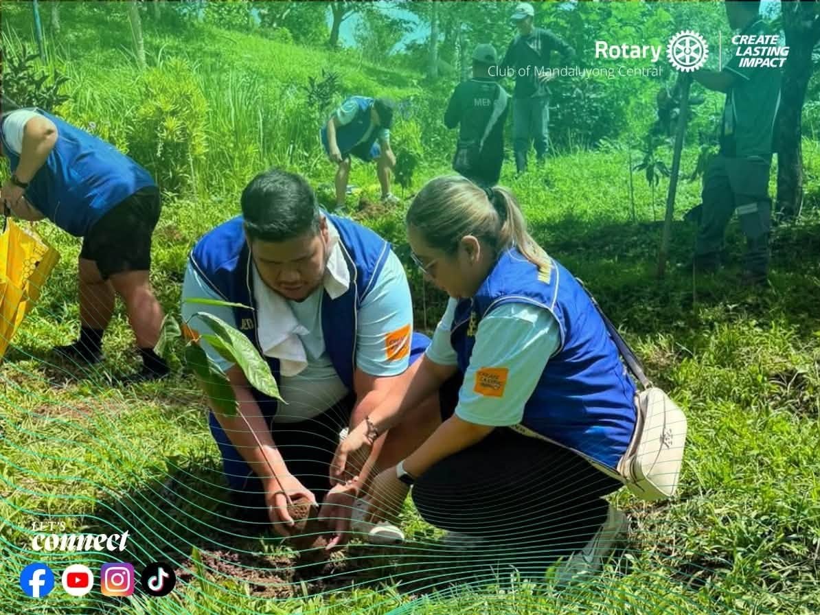 RCMC volunteers planting avocado and cacao seedlings in Tanay, Rizal