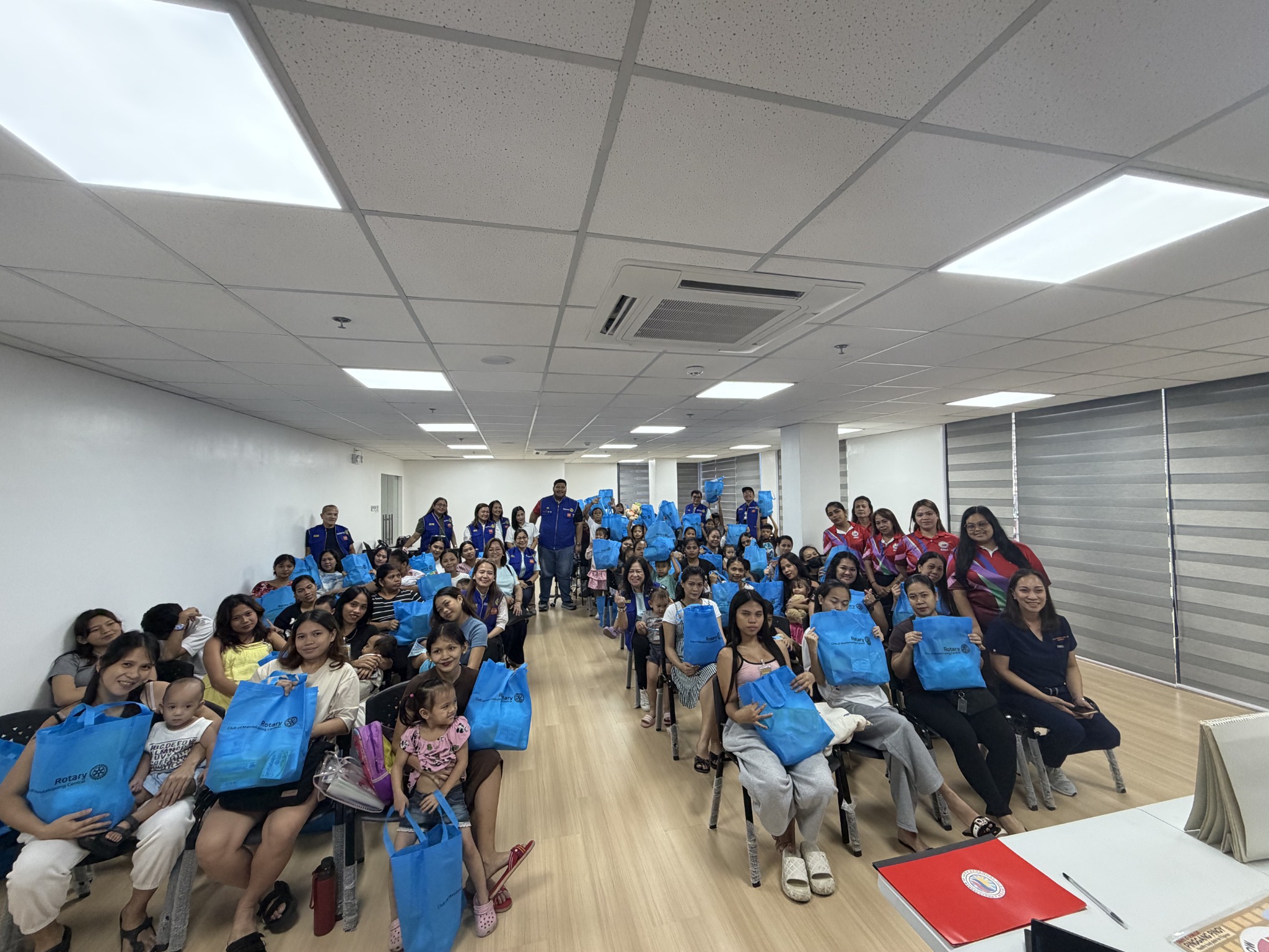 Milk Mo, Love Mo mothers, children, volunteers and partners